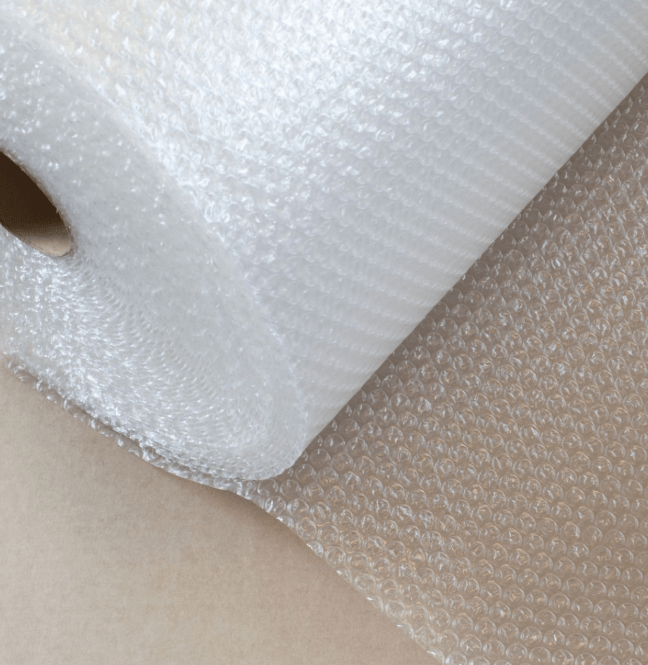 A large roll of high-quality, air-cushioned bubble wrap for protecting fragile items during a move or in storage