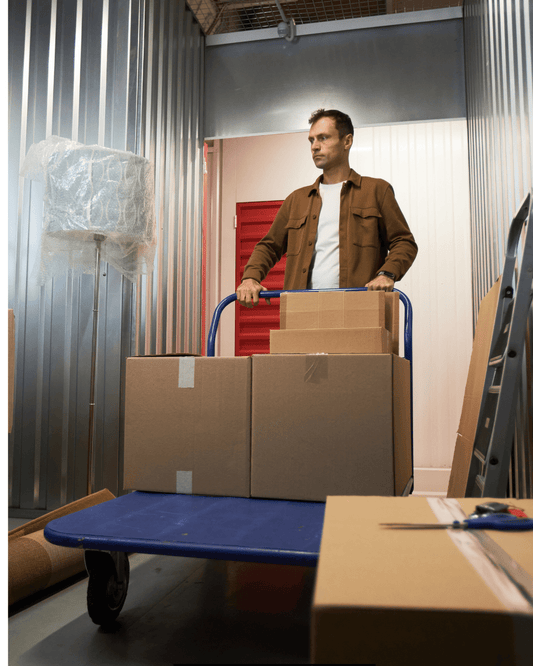 Clean, secure, and well-lit corridor of Isle Store self-storage units in cowes